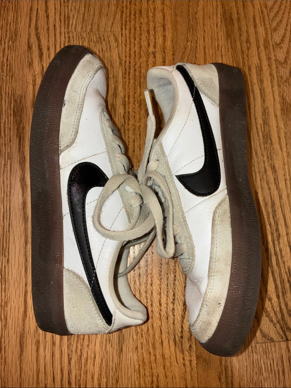 Nike Kids White Sneakers with Black Swoosh
